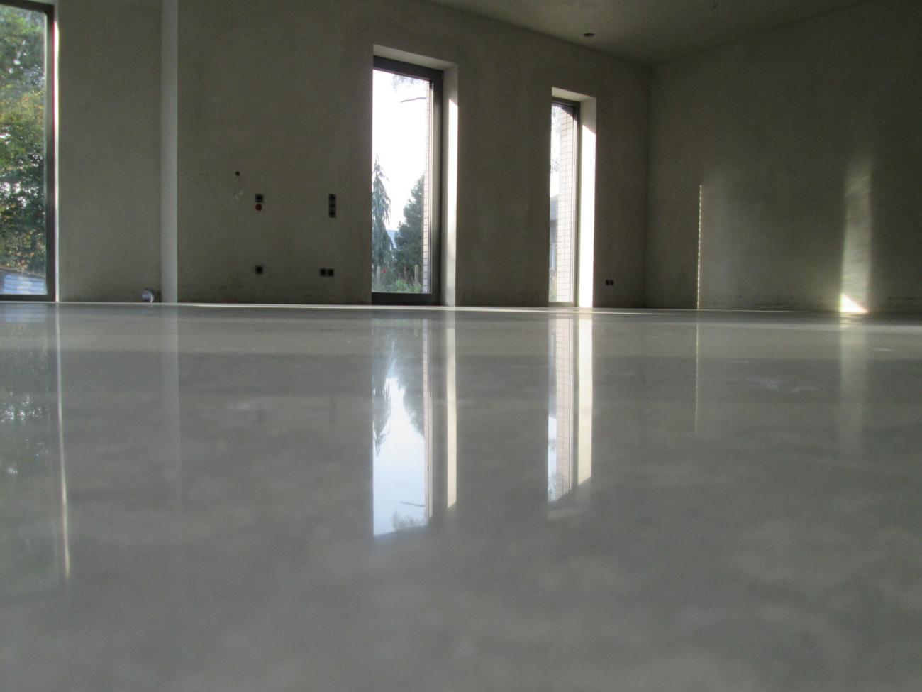 Beautiful stained and polished concrete floor - Queen City Surface Coatings